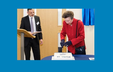 HRH the Princess Royal cuts a cake to mark the 30th anniversary of Sefton Carers Centre