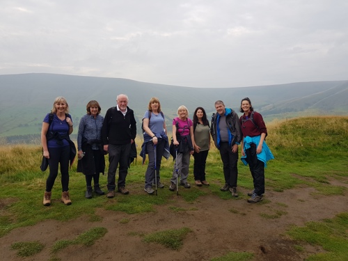 Walkers walking up Kinder Scout