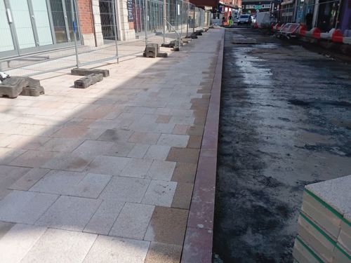An progress photo of paving on Market Street north