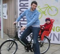 Decorative photo of father and son outside of Southport Cycle Centre