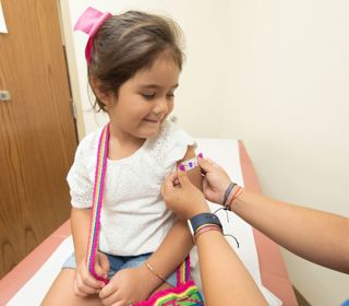 Child being vaccinated