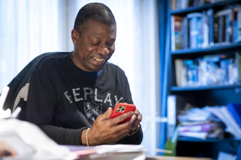 A man using a mobile phone.