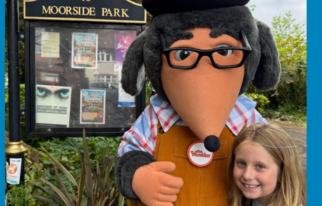 Womble and mini womble at entrance to Moorside Park