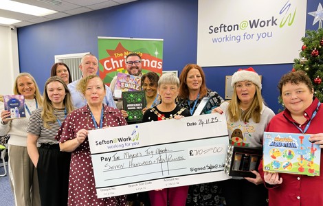 Sefton@Work Manager Linda Patterson and Sefton Mayor Cllr June Burns and members of the Bootle Strand Sefton@Work team 