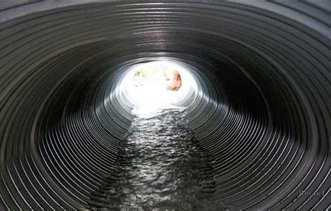 Water flowing through a drainage pipe