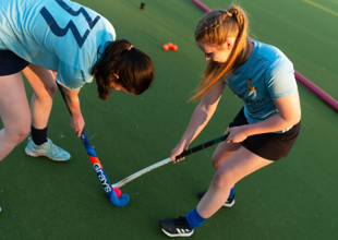 Girls playing Hocky