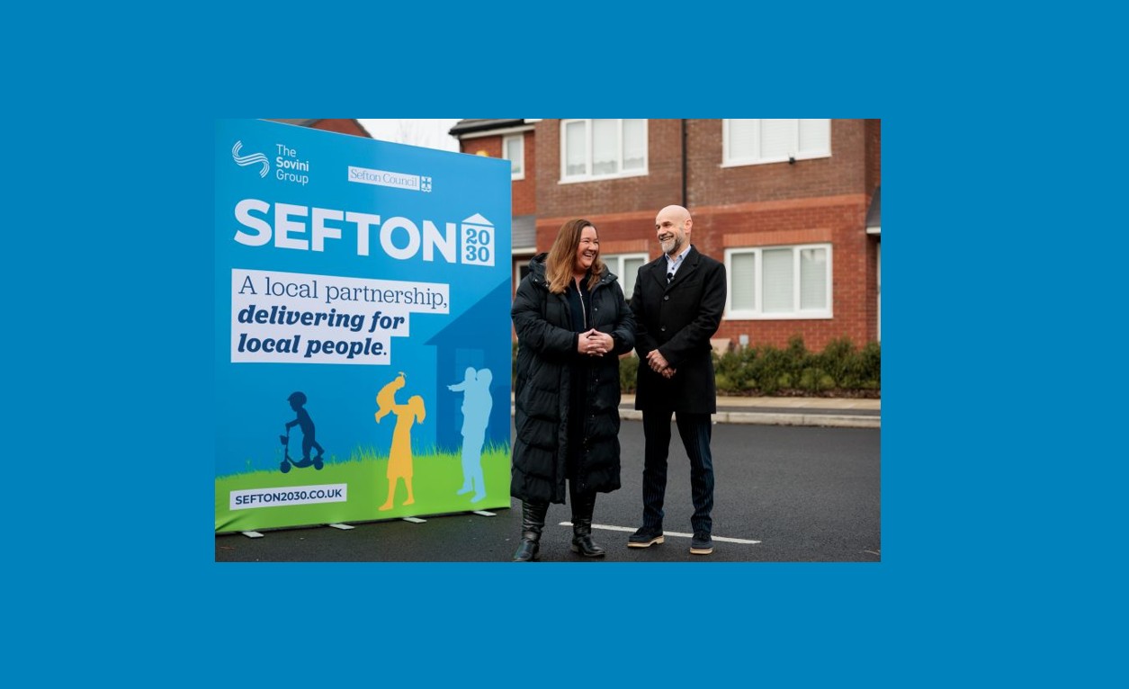 Cllr Atkinson and Roy Williams in front of Sefton 2030 sign