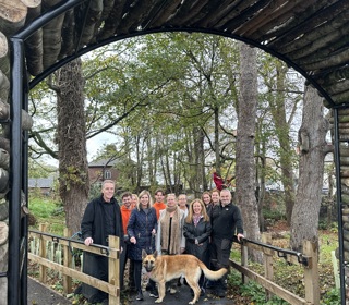 group of people at the entrance of Rowlands Dell